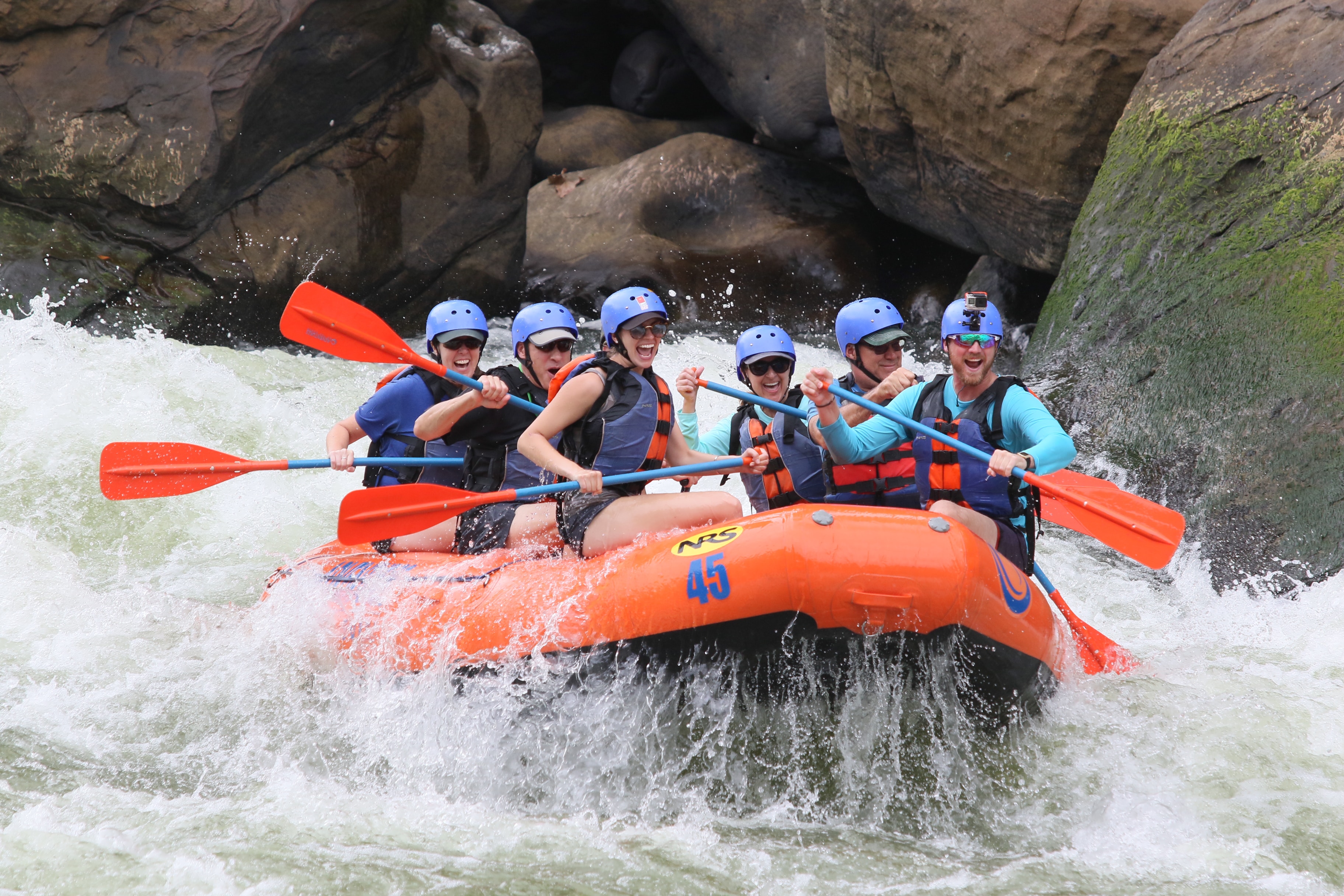 People enjoying white water rafting